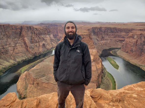 Software developer Dean McNeil standing in front of Horseshoe Bend near Page, Arizona.